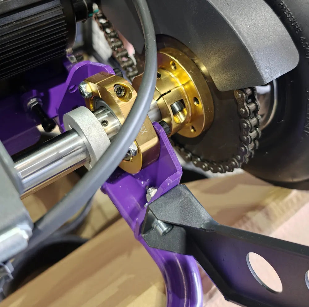 Gold alloy hub, chain drive and live rear axle